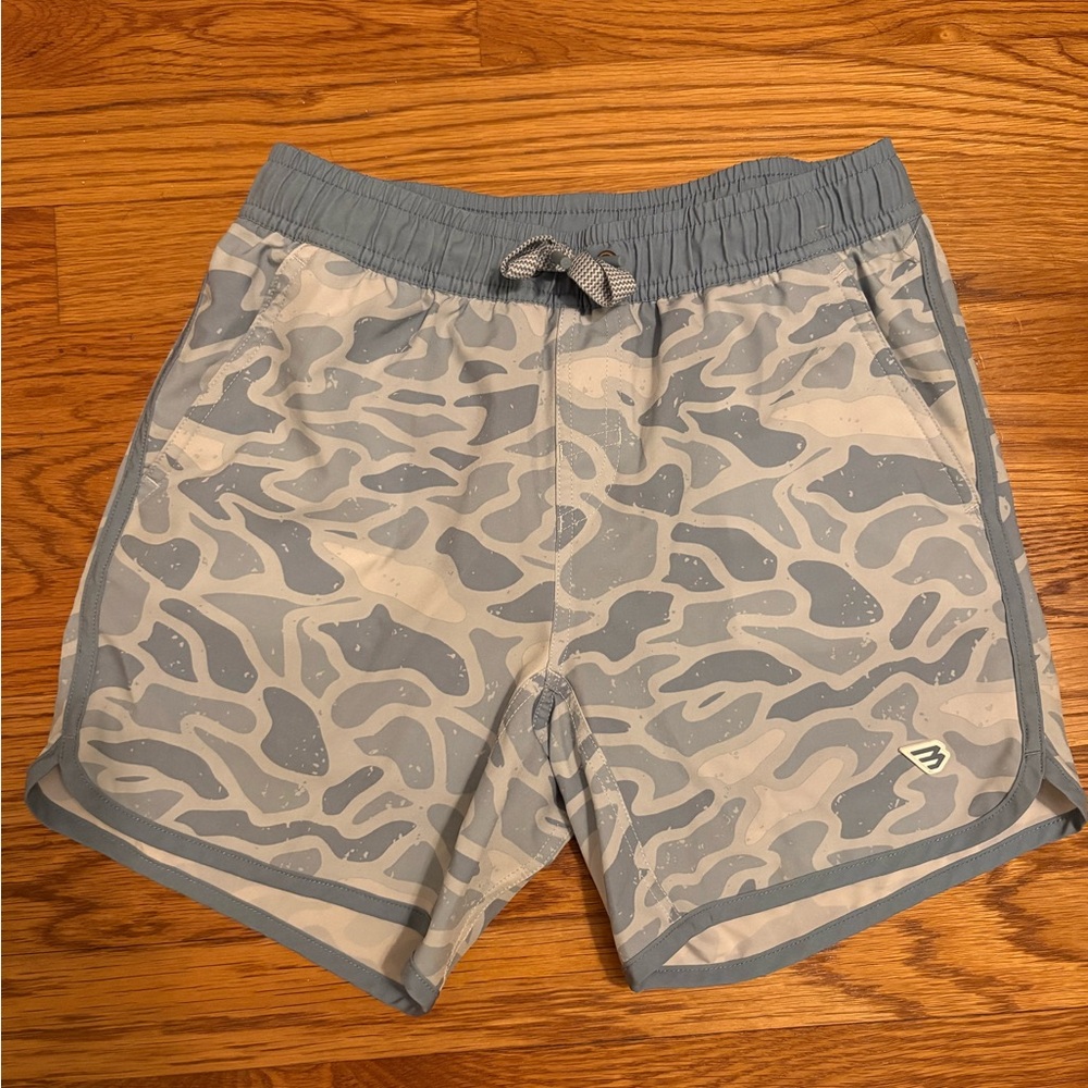 BURLEBO kids blue camo swim trunks